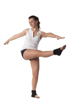 Girl is posing for photo while doing gymnastics