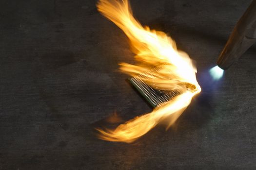 burning a CPU with a welding torch. 