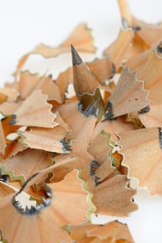 Pencil in an environment shavings. A photo close up
