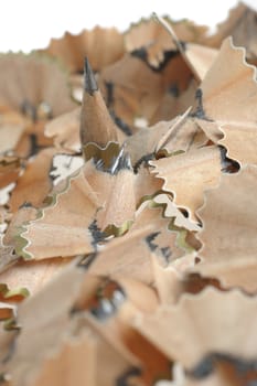 Pencil in an environment shavings. A photo close up
