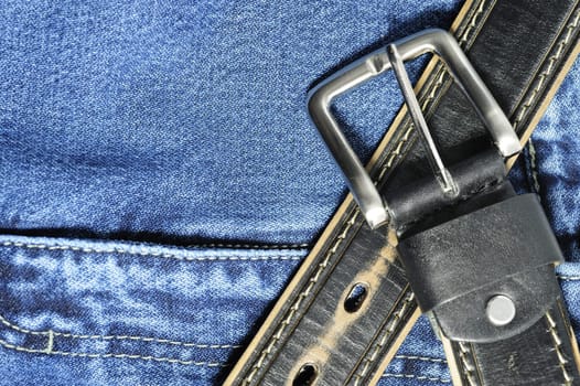 Jeans. A fragment trousers - jeans, with a leather belt