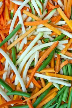 Background of julienne vegetables:  green beans, baby marrows and carrots