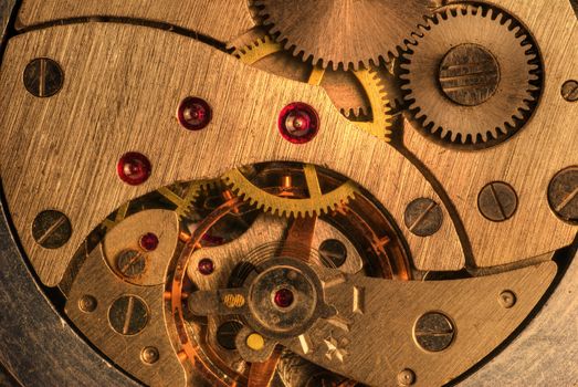 The mechanism of analog hours. A photo close up