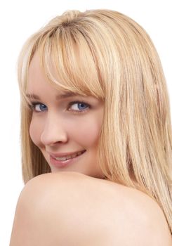Portrait of a beautiful blonde woman with light blue eyes and natural make-up