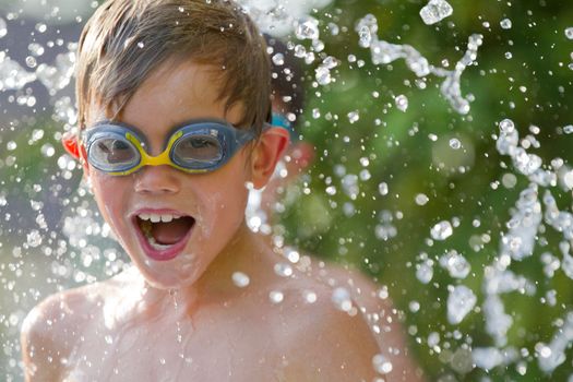 Young child playing in the water