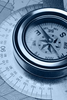 Compass and card. The device for the instruction of a direction and a card