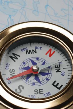 Compass and card. The device for the instruction of a direction and a card