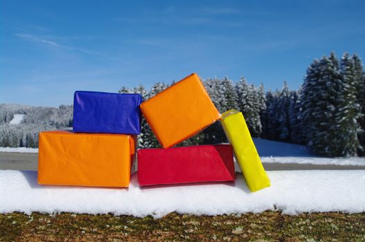 present parcels outside in a snowy landscape...