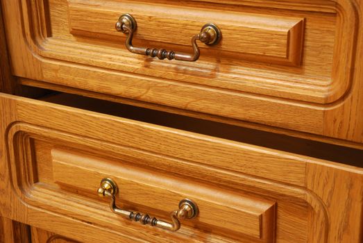 Boxes of a locker. A locker from a tree, with carved incrustation and iron handles
