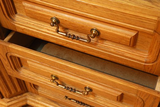 Boxes of a locker. A locker from a tree, with carved incrustation and iron handles