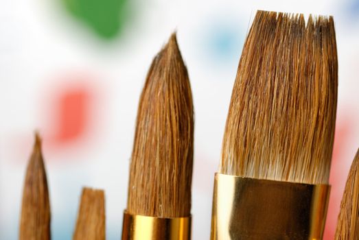 Paintbrush. Brushes for drawing. C blur a color background