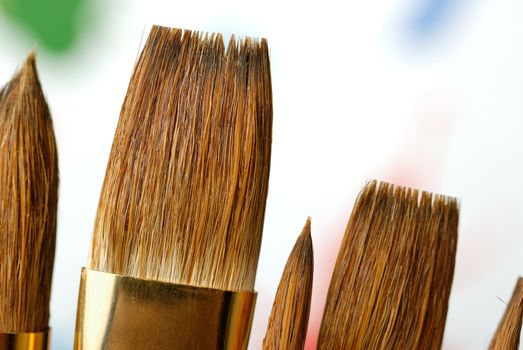 Paintbrush. Brushes for drawing. C blur a color background
