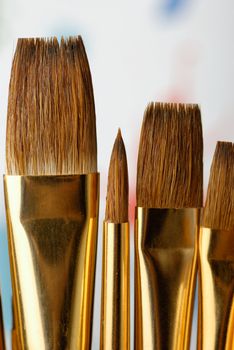 Paintbrush. Brushes for drawing. C blur a color background
