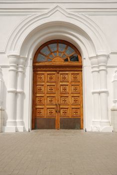 Wooden doors. An entry in a building of a man's monastery. East Ukraine
