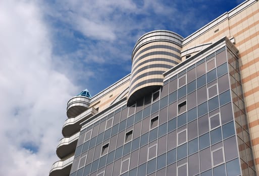 Modern building. A construction from glass and steel in modern style 