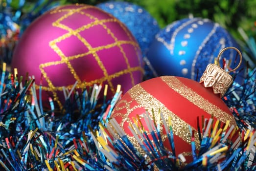 Christmas background. New Year's toys and ornaments bright and glow 