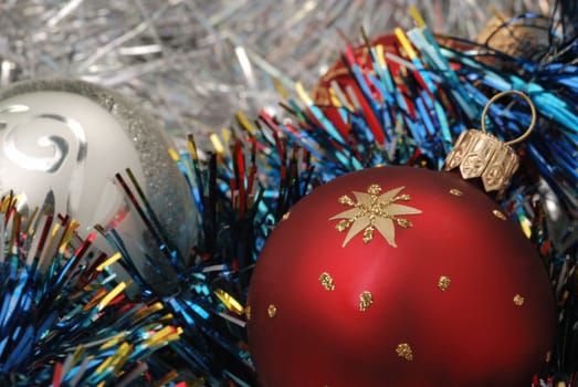 Christmas background. New Year's toys and ornaments bright and glow 