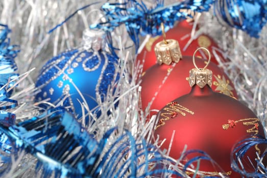 Christmas background. New Year's toys and ornaments bright and glow 