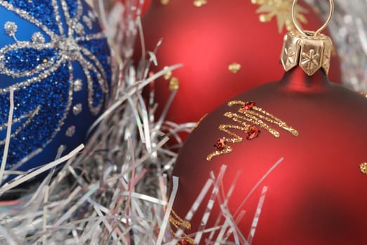 Christmas background. New Year's toys and ornaments bright and glow 