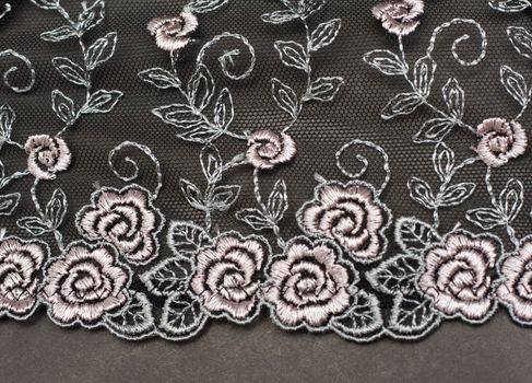 Decorative lace with pattern on gray background