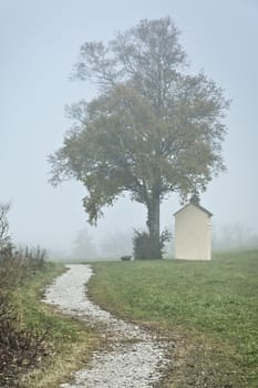 An image of a beautiful landscape with fog in bavaria germany