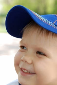 Portrait of the boy. The child with blue eyes, white hair
