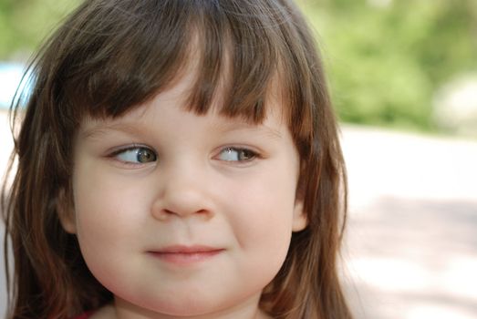 Portrait of the girl. Caucasian the child with brown eyes