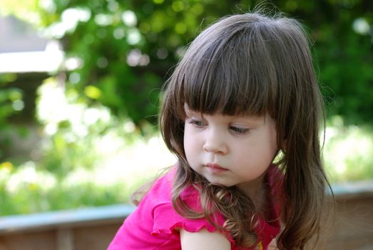 Portrait of the girl. Caucasian the child with brown eyes