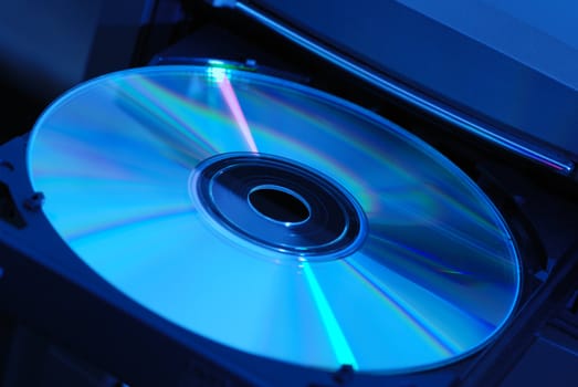 Disk in the  drive. A photo close up CD of a disk
