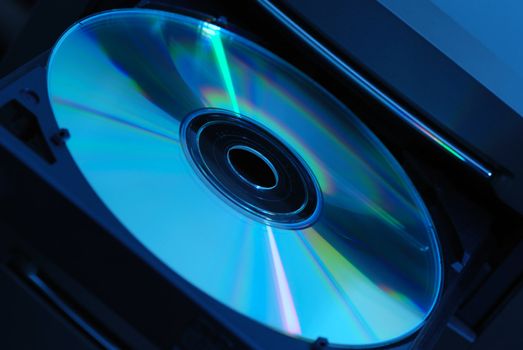 Disk in the  drive. A photo close up CD of a disk