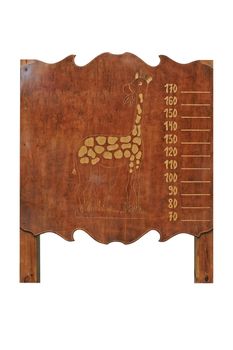 wooden measuring device of growth for children with the image of giraffe