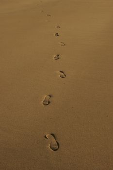 footprint tracks on a beach in ireland