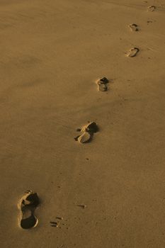 footprint tracks on a beach in ireland