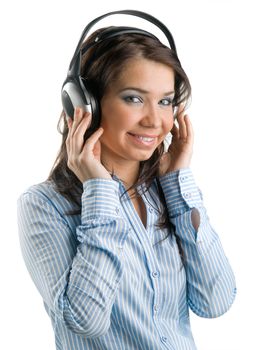 Young girl listens to music  on a white background