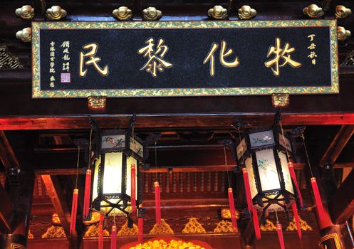 Interior of Chinese buddhist shrine in the city of Shanghai China