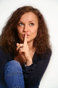 Portrait of the young girl demanding silence