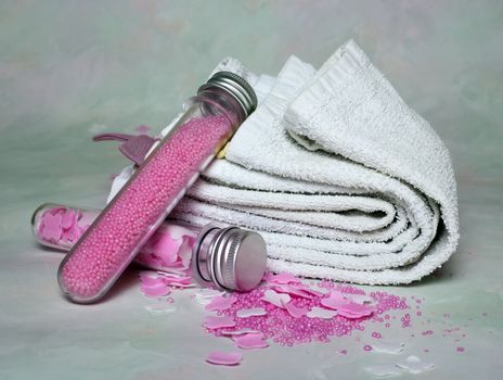 Bottles with pink salt for baths