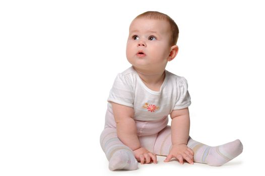 The baby. Age of 8 months. It is isolated on a white background