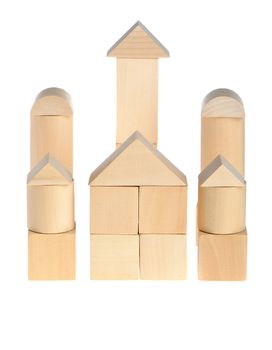 The wooden house. Children's toys - wooden cubes. It is isolated on a white background