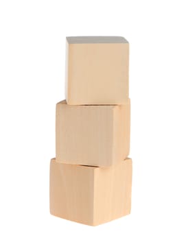 construction from wooden cubes. It is isolated on a white background