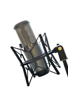 Studio musical microphone. Back light, it is isolated on a white background