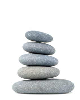 Balance. A construction from a pebble. It is isolated on a white background