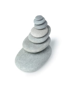 Balance. A construction from a pebble. It is isolated on a white background