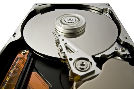 hard disk with rotating platter and fixed read write head in white background. extreme perspective