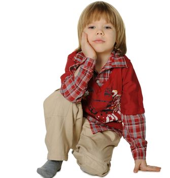 Portrait of the little boy. It is isolated on a white background