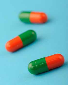 set capsules on blue background. Photo closeup