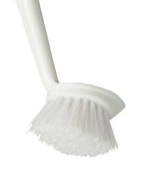 Brush for washing utensils. It is isolated on a white background.