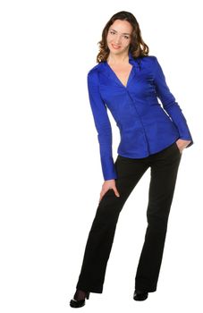 The attractive girl in trousers and dark blue shirt. It is isolated on a white background