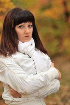 The girl in an autumn forest. The European appearance