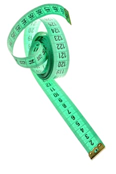 Measuring tape of the tailor green color. It is isolated on a white background